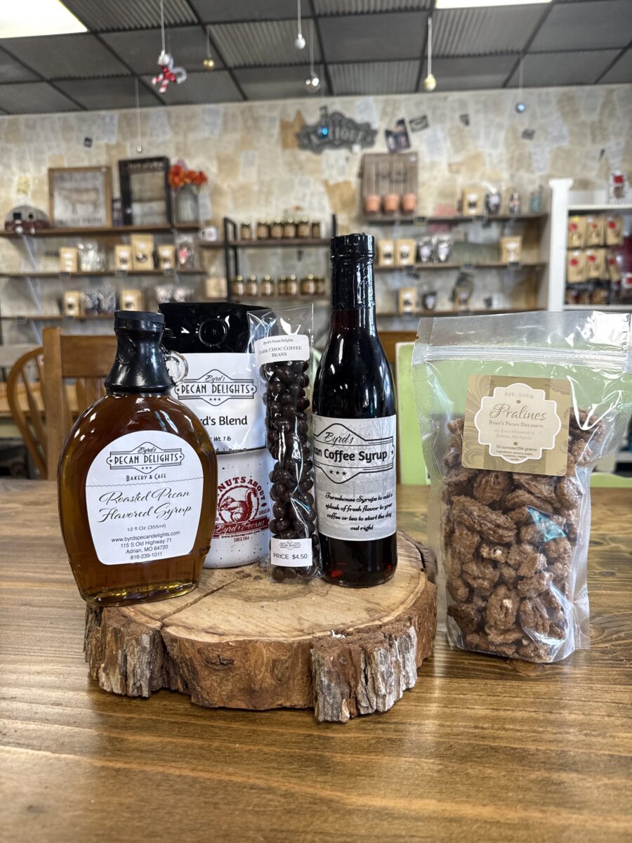 Syrup, coffee, beans and pralines from Byrd's Pecan Delights arranged for display.