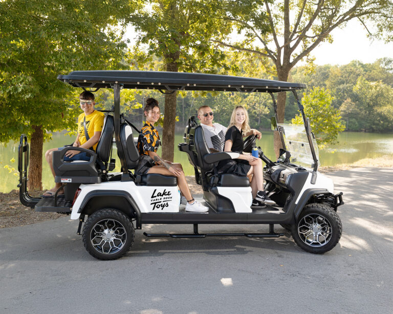 People ride a rental from Table Rock Lake Golf Cart Rentals.