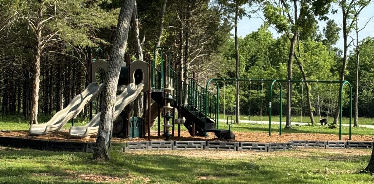 Full playground, swings, and sand box!