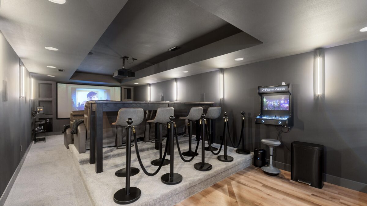 Private home theater room with bar seating for events and retreats