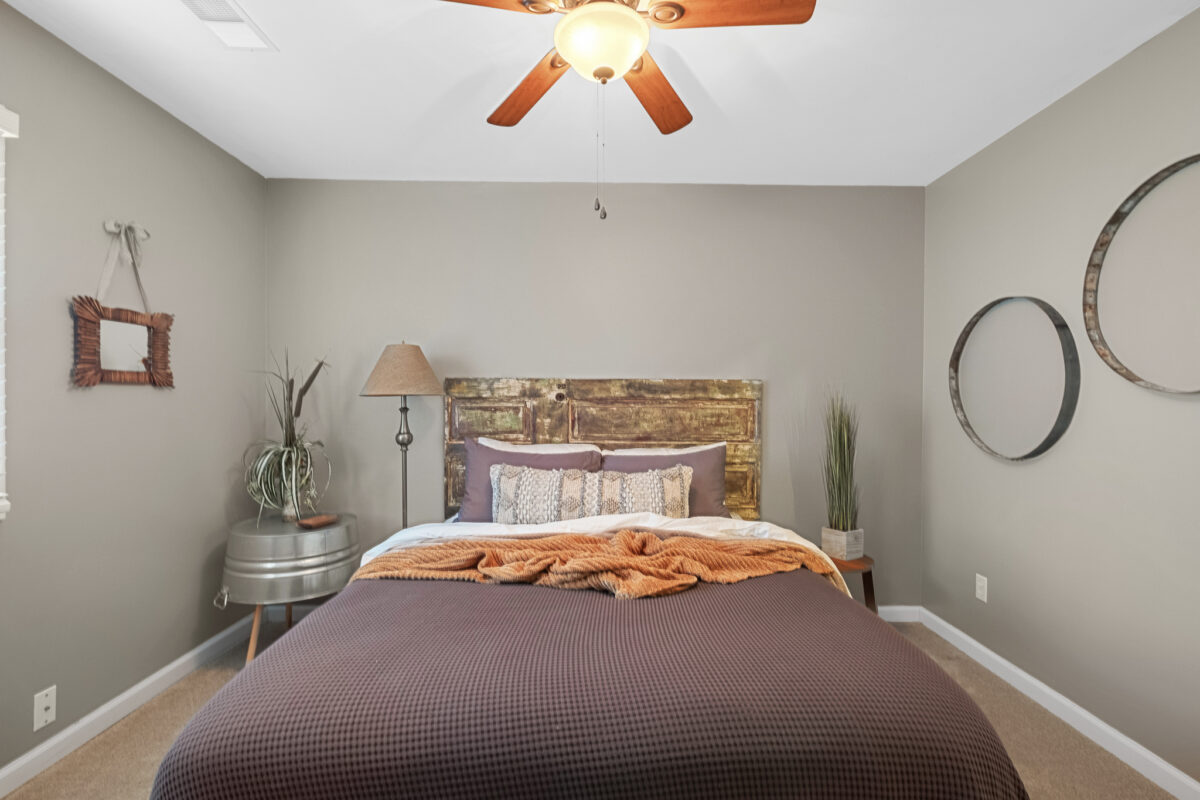 A furnished and lit guest room.