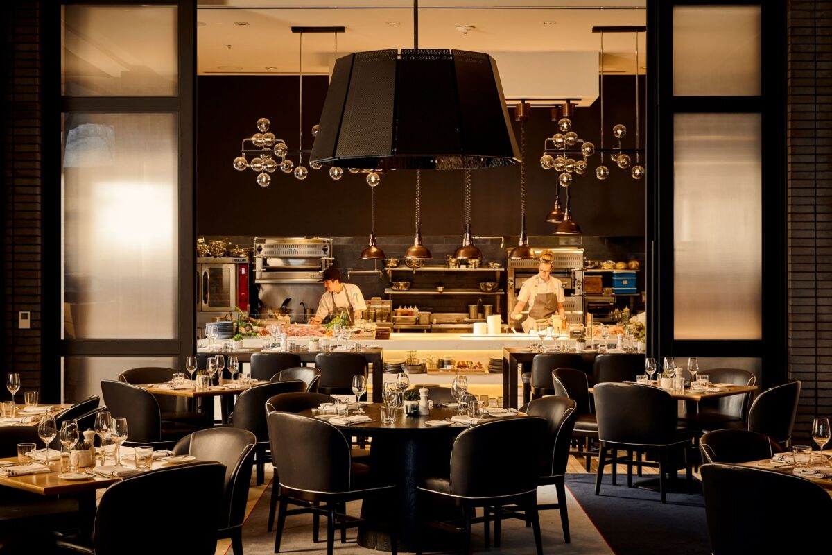 An orange-lit bourbon room and tasting space.
