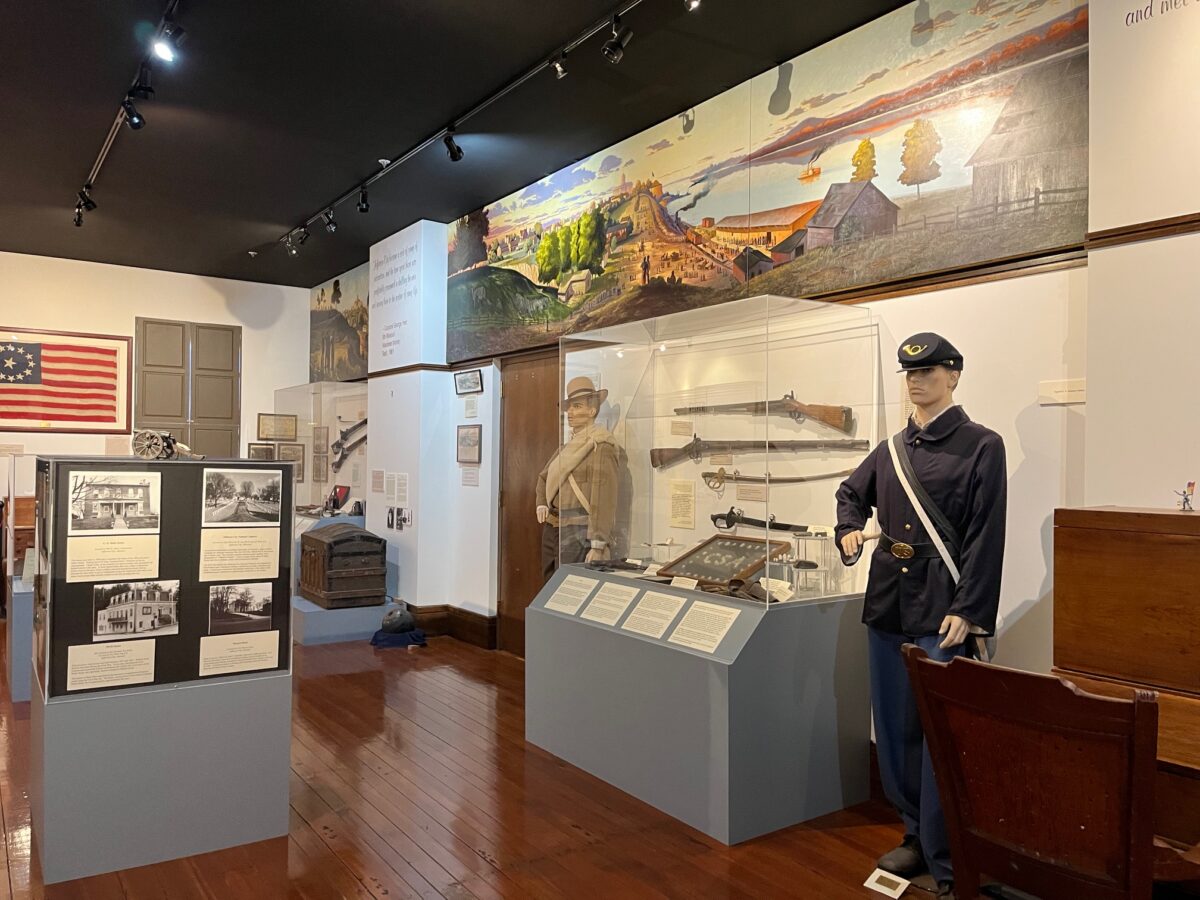 the interior of a museum, complete with Civil War-era uniforms and artifacts.