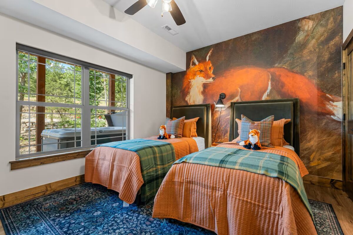 Plaid Fox fox-themed bedroom with two beds.