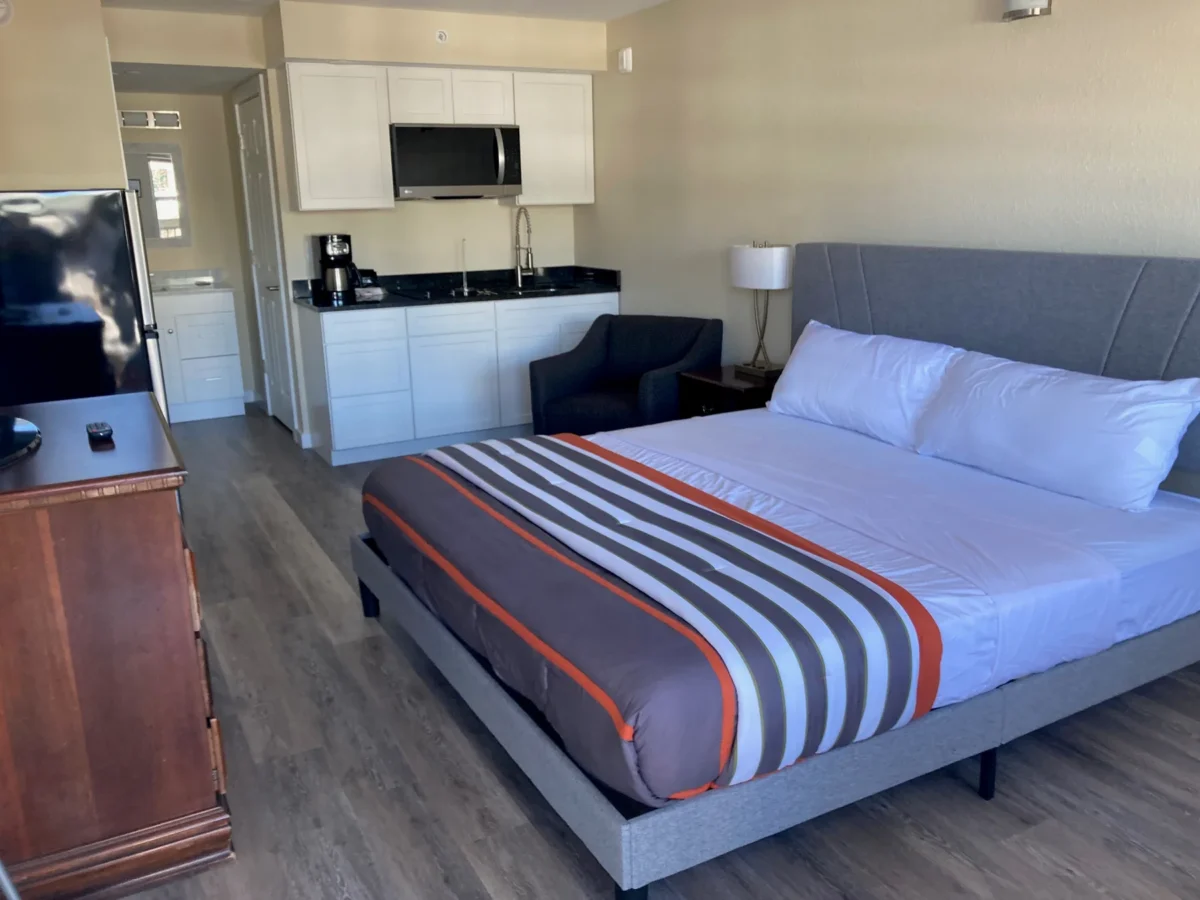 Studio king bed and kitchenette at Branson King Resort