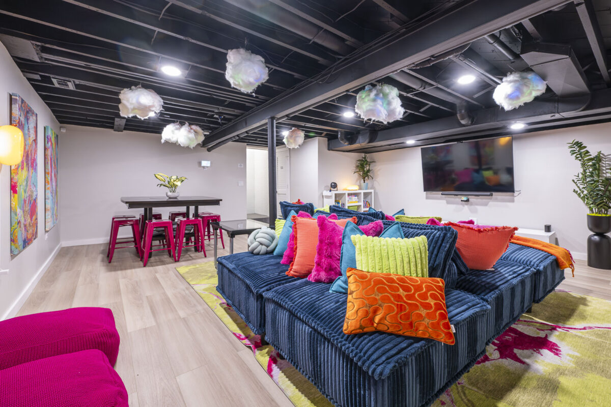 Private game lounge with arcade entertainment at The Blue Villa in Lee's Summit.