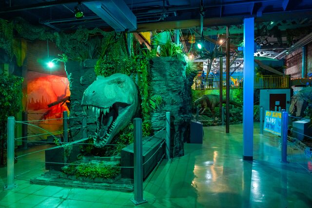 Dinosaur replicas dominate an exhibit at the Discovery Center of Springfield.