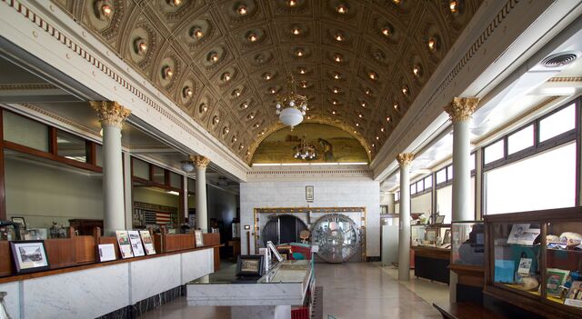 The Excelsior Spring Museum is located in a historic building with an arched ceiling.