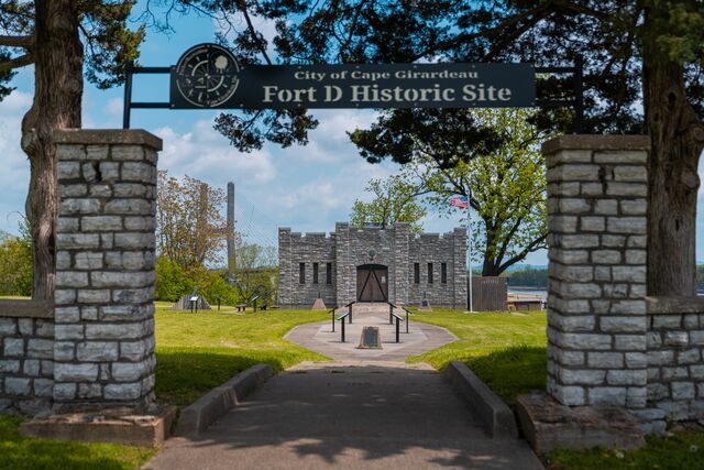 A stone building houses the Fort D Historic Site.