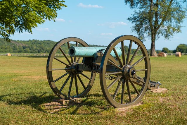 A Civil-War cannon sits in a field at Wilson's Creek National Battlefield.